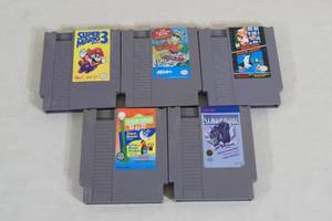 lot 103 image: Original Nintendo Games - Xenophobe, Mario 3, Simpsons
