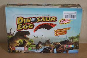 lot 142 image: Unopened Box of Dinosaur Egg Growing Pet Toys
