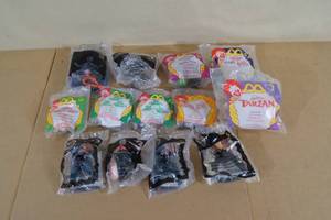 lot 130 image: Walt Disney Happy Meal Type Toys - Tarzan, Mulan, Toy Story