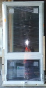 lot 13 image: Minnkota Window. Picture On Top, Awning on Bottom, 71 H x 35 W Plus Nailing Fin.