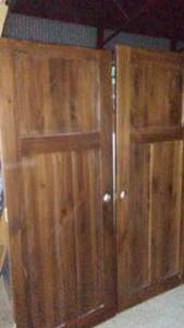 lot 397 image: 30  Doors (2) 74.5 in. and 75.75 in. Tall, Could Be Cut to Match, Stained the Same Front and Back.