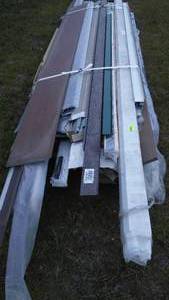 lot 424 image: Misc. 2 Barn Door Sliding Tracks, Metal, Vinyl Trim & More.