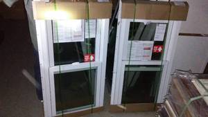 lot 676 image: 2 Thermo Tech Double Hung Windows
