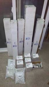 lot 688 image: White Railing Balusters and Post Caps & Hardware.