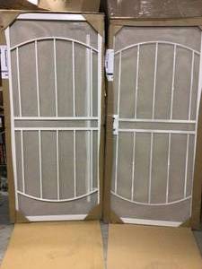 lot 3 image: Lot of 2 72 in. x 80 in. Arcada White Surface Mount Outswing Steel Double Security Door with Expanded Metal Screen by Unique Home Designs Customer Returns See Pictures