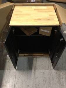 lot 8 image: Heavy Duty Welded 20-Gauge Steel 2-Door Garage Base Cabinet in Black (28 in. W x 32 in. H x 21.5 in. D) by Husky Customer Returns See Pictures