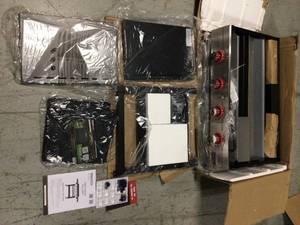 lot 26 image: 4-Burner Propane Gas Griddle in Black with Cover by Royal Gourmet Customer Returns See Pictures