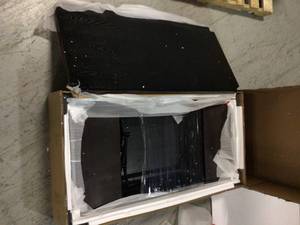 lot 35 image: Decatur 48 in. Black Large Rectangle Wood Coffee Table with Lift Top by Noble House Customer Returns See Pictures