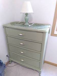 lot 9 image: Adorable Sage Green Dresser with Decorative Lamp and Table Runner