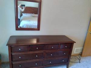 lot 39 image: Beautiful Dark Stained Low-Boy Dresser and Matching Mirror 