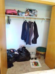 lot 40 image: Full Closet Wicker Rattan Stool, Crock Pot, Blankets, Garbage Bags, Mens Sport Coats, Etc. 