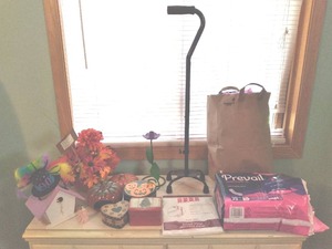 lot 46 image: Beautiful Home Decor and Necessary Womens Personal Items Depends, Prevail, Etc.