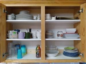lot 68 image: Everything in the Cupboard Decorative Stoneware, Tea Pot, Storage Containers, Saucers, Plates, Mugs, Etc. 