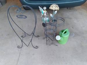 lot 78 image: Patio and Garden Decor Welcome Plant Stand, Nesting Plant Stand, Watering Can, and More