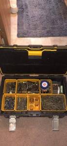 lot 114 image: Dewalt tool box full of hardware