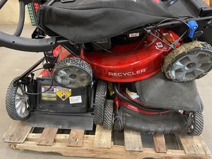 Pallet with assorted Toro Troy Bilt Mowers various models and conditions customer Returns see pictures