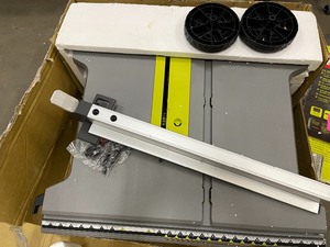 RYOBI 15 Amp 10 in. Expanded Capacity Table Saw With Rolling Stand Open box in like new condition customer return see pictures