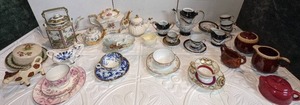 lot 99 image: Large Lot of Collectible Teapots, CupsSaucers, Sugar & Cream Pieces