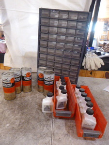 lot 83 image: Parts Bin and 4-Cycle Oil