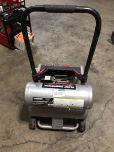 lot 8 image: 4.5 Gal. Portable Electric-Powered Silent Air Compressor by Husky Customer Returns See Pictures
