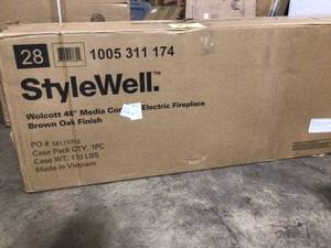 lot 19 image: Wolcott 48 in. Media Console Electric Fireplace in Brown Oak by StyleWell Customer Returns See Pictures