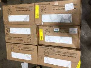 lot 35 image: Lot of 6 QuicTile 12 in. x 24 in. Calacatta Marvel Matte Porcelain Locking Floor Tile (9.6 sq. ft.  case) by Daltile Customer Returns See Picures