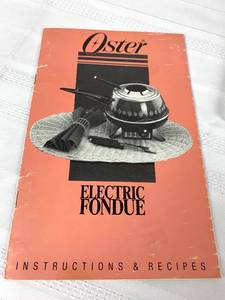 lot 203 image: Oster Vintage Electric Fondue Pot and Variety of Recipe Books