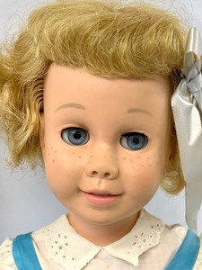 lot 58 image: 1960 Chatty Cathy in Original Dress, 2 Outfits and Banner Toy Tableware Set