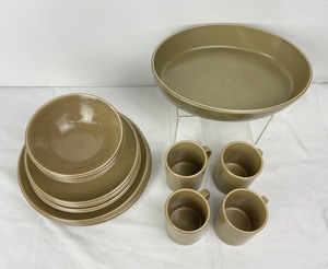 lot 300 image: Brown Stoneware Dish Set - The Khaki Collection  Calvin Klein Swid Powell