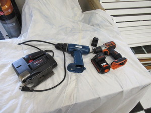 lot 30 image: 2 cordless drills and sabre saw