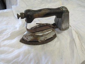 lot 32 image: very old steam iron