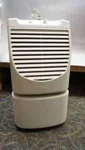lot 51 image: Whirlpool Dehumidifier--Model #AD40G1--Serial #QJ2909848--On Casters--Capacity 40 Pints--23 12 Tall  x  14 Deep  x  12 12 Wide