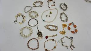 lot 64 image: A Lot Full Of Miscellaneous Jewelry --Necklaces-Bracelets- Etc.