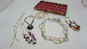 lot 66 image: Six Collectible Necklaces And A Divided Jewelry Box