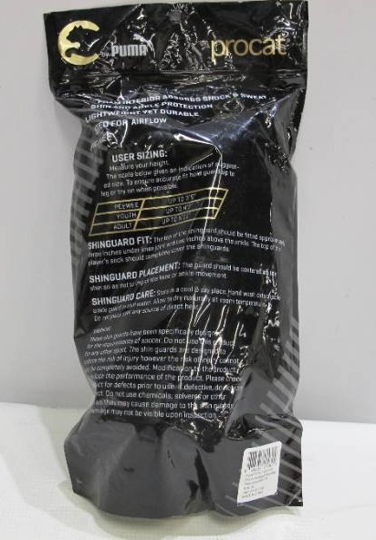 lot 643 image: Puma ProCat Technique Soccer Futbol Stirrup Shin Guards