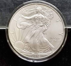lot 29 image: 2012 AMERICAN SILVER EAGLE 1 TROY OZ .999 FINE SILVER IN AIRTITE
