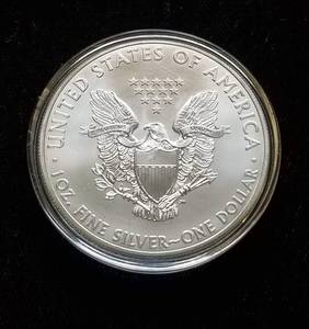 lot 30 image: 2013 AMERICAN SILVER EAGLE 1 TROY OZ .999 FINE SILVER IN AIRTITE