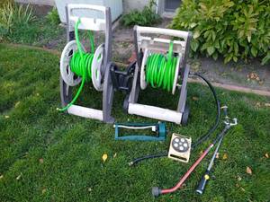 lot 40 image: Two Hoses, Reels & Accessories