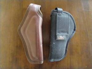 lot 89 image: Two Pistol Holsters