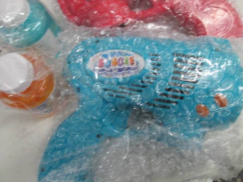 lot 117 image: 2 Bubble Guns open box Retail $31.9...