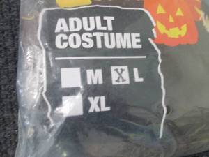 lot 0144 image: Spooktacular Creations Adult Large Scarecrow Costume open pkg