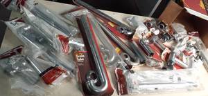 lot 53 image: Overflowing Box of plumbing mainten...