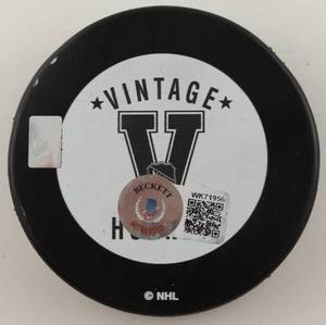 lot 26 image: Mike Modano Signed Minnesota North Stars Hockey Puck