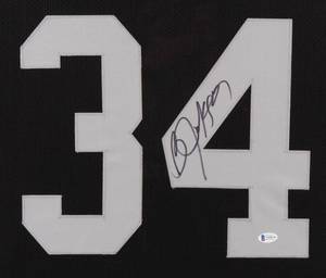 lot 0A image: Bo Jackson Signed Black and Silver Pro Style Jersey, Framed with Photos 35 x 43