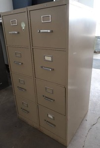 2 MATCHING HON 4 DRAWER FILE CABINENTS.