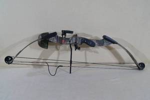 lot 12 image: PSE Nova Left Handed Compound Bow with Sight and Quiver