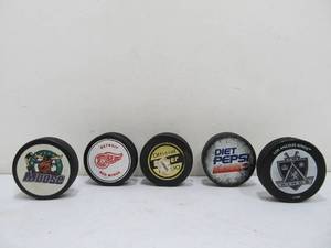 lot 31 image: Group of Vintage etc Hockey Pucks