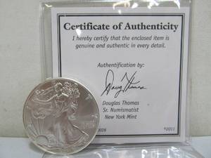 lot 256 image: 2011 One Ounce Fine Silver Dollar Coin
