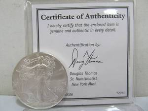 lot 257 image: 2012 One Ounce Fine Silver Dollar Coin