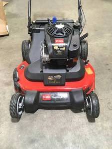 lot 23 image: Toro TimeMaster 30 in. Briggs & Stratton Personal Pace Self-Propelled Walk-Behind Gas Lawn Mower in good condition  customer returns see pictures